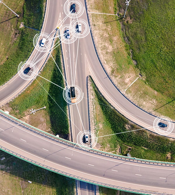 Intelligent Vehicles Cars Communicating Ai Logistic. Autonomous Smart Roads Traffic Road Junction Interchange Motorway Triangulation Of Traffic Data